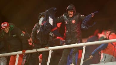 A fan of Independiente shouts during the interruption of the Copa Sudamericana round of 16 second leg football match between Argentina's Independiente and Chile's Universidad de Chile at the Libertadores de America stadium in Avellaneda, Buenos Aires province, Argentina on August 20, 2025.
