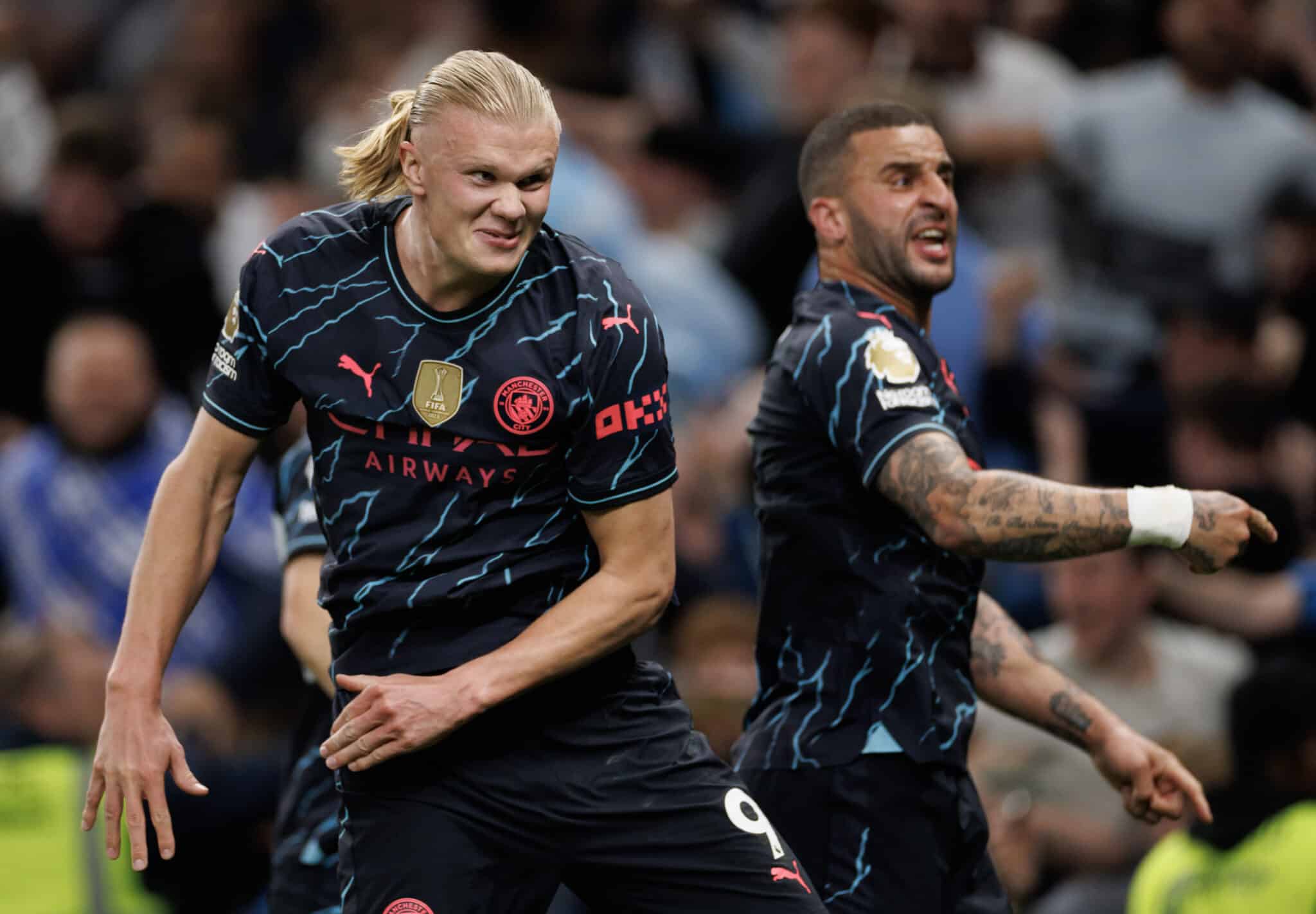 Walker e Haaland celebrando vitória do City