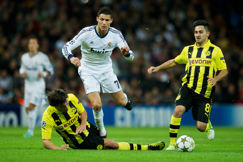 Cristiano Ronaldo e Gundogan em ação por Real Madrid x Borussia Dortmund